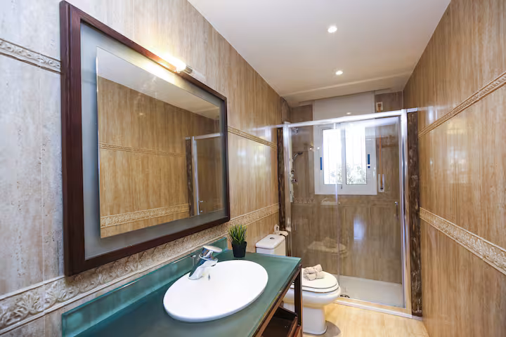 Airbnb bathroom with bright finishes
