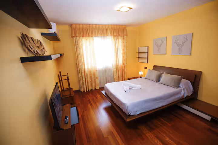 Cozy bedroom with a double bed for two guests